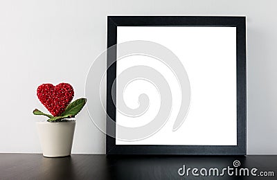 Valentines Heart Flower pot with blank frame Stock Photo