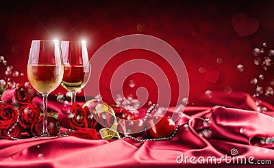 Valentines or wedding concept. Wine cups red roses and romantic Stock Photo