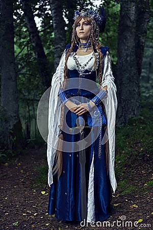 Valkyrie warrioress in magpie costume. Stock Photo