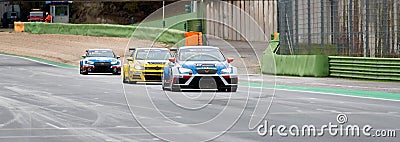 Cupra and Volkswagen Golf TCR race cars challenging on straight racetrack Editorial Stock Photo