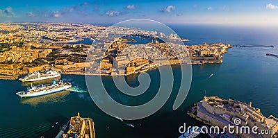 Valletta, Malta - Aerial panoramic skyline view of the Grand Harbour of Malta with cruise ships Stock Photo