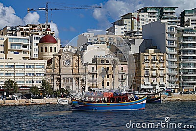 VALLETTA, MALTA - NOVEMBER 10TH 2019: Harbour cruise vessel about to set sail from Sliema on a round the island of Malta trip Editorial Stock Photo