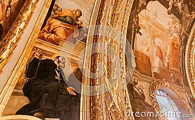 Priest on old fresco of the 16th century St John`s Cathedral, historical Roman Catholic church Editorial Stock Photo