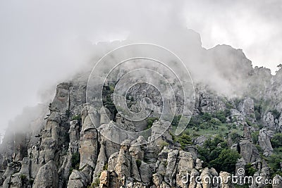 Valley of Ghosts with low lying clouds, Crimea Stock Photo