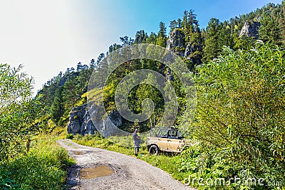 Car UAZ-31512 among the taiga. Gorny Altai, Siberia, Russia Editorial Stock Photo