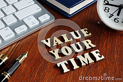 Value your time from wooden letters Stock Photo