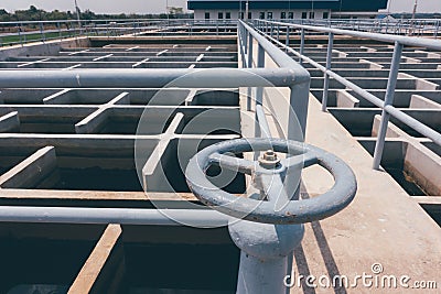 Valve at water treatment plant Stock Photo