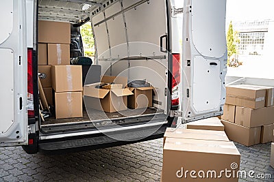 Van On Street From Relocation Service Business Stock Photo