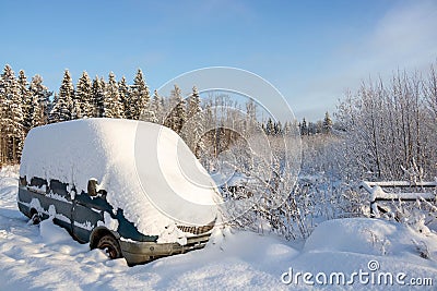 The van of the car covered with a deep cover of white snow, with a copy of the space Stock Photo