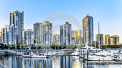 Skyscapers lining the skyline of Yaletown with Quayside Marina along False Creek Inlet of Vancouver, British Columbia, Canada Editorial Stock Photo