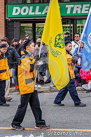 VANCOUVER, CANADA - February 2, 2014: The 28th Kitsilano Scout Group marching during Chinese New Year parade Editorial Stock Photo