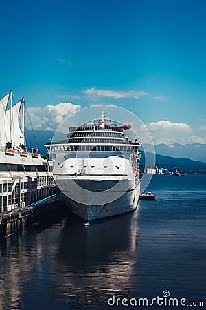 Vancouver / Canada - July 28.2006: Massive Cruise Ship docked by the pier. Editorial Stock Photo