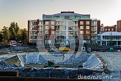 VANCOUVER, CANADA - MARCH 06, 2020: Large construction site at oakridge mall construction machinery Editorial Stock Photo