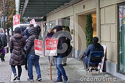 Striking hotel workers block sidewalk in downtown Vancouver Editorial Stock Photo