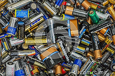 Vancouver, Canada - October 2, 2004: Pile of dead used single use disposable batteries. Editorial Stock Photo