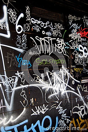 Vandalism Graffiti chaos on Black Van Editorial Stock Photo