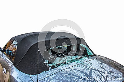 Vandalized car - Convertible soft top silver sports car with back window broken out - closeup and isolated on white - room for Stock Photo