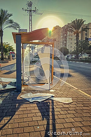 Vandals demolished a bus stop in a living neighborhood in Israel Editorial Stock Photo