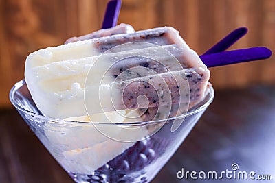 Vanilla, Blueberry and Coconut Milk Popsicles Stock Photo