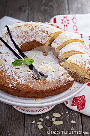 Vanilla, chocolate and almond cake on a stand Stock Photo