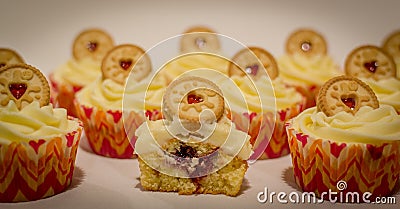 Vanilla cream cupcakes with jammy biscuit Stock Photo