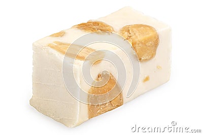 Vanilla flavored almond and pistachio white nougat isolated on white Stock Photo