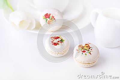 Vanilla French Beautiful White Macarons on White Background Cup of Coffee Beautiful Dessert Modern Dessert Stock Photo