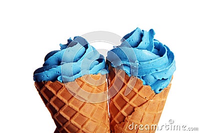 Vanilla frozen yogurt or colorful soft ice cream in waffle cone Stock Photo