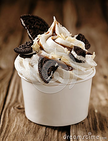 Vanilla ice cream with oreos and chocolate sauce Stock Photo