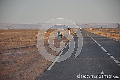 Road vanishing in Morocco desert near Merzouga Stock Photo