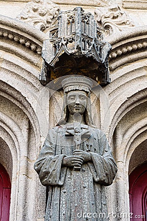 Detail of sculpture of St Mary in the entrance of the Cathedral of Vannes Editorial Stock Photo