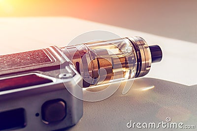 Vape mod on dna chip and tank with vaping liquid Stock Photo