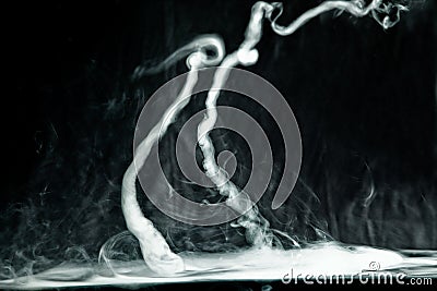 Vape trick tornado on a dark background Stock Photo