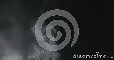 Vapor steam rising over black background Stock Photo