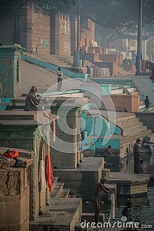 Early morning meditation and bathing on the ganga ghats in Varanasi, Uttar Pradesh, India Editorial Stock Photo