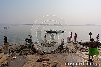 VARANASI, INDIA - December 26, 2014: Laundry in holy Ganges river, Varanasi, India Editorial Stock Photo