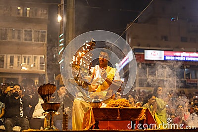 Priest performing ganga aarti at dasaswamedh ghat in varanasi Editorial Stock Photo