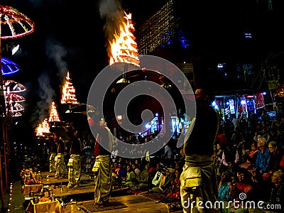 Varanasi, Uttar pradesh, India-02/21/2020: Some Brahman priest doing Ganga aarti at Varanasi ghat, India Editorial Stock Photo