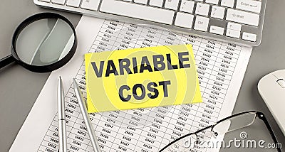 CONSISTENCY IS THE KEY text written on notebook on grey background with chart and keyboard, business concept Stock Photo