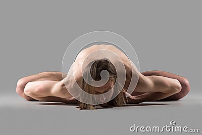 Variation of purna titli yoga pose Stock Photo