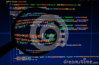 Varicoloured php code under magnifier Stock Photo