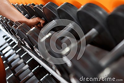 Variety of barbells in sport club Stock Photo