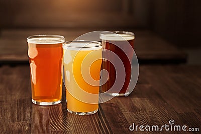 Variety of beers. Dark, light, unfiltered drink on table Stock Photo