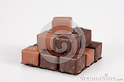 Variety chocolate pralines in pyramid view in white background Stock Photo