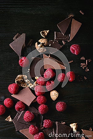 Variety of chopping chocolate with raspberries Stock Photo