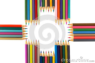 Variety of colored pencils arranged as a Plus sign, isolated on Stock Photo