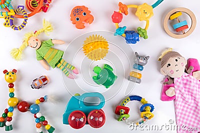 Variety of colorful baby toys on white. top view Stock Photo