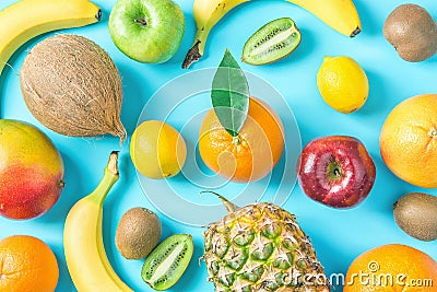 Variety of Different Tropical and Seasonal Summer Fruits. Pineapple Mango Coconut Oranges Lemons Apples Kiwi Bananas Pattern Stock Photo