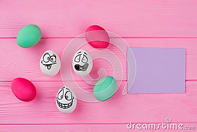 Variety of Easter eggs and blank card. Stock Photo