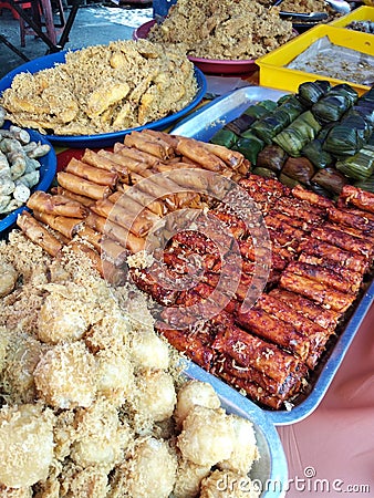 Variety of famous traditional Malaysian sweet and dessert sell-by hawkers in the street Ramadhan Bazaar. Stock Photo